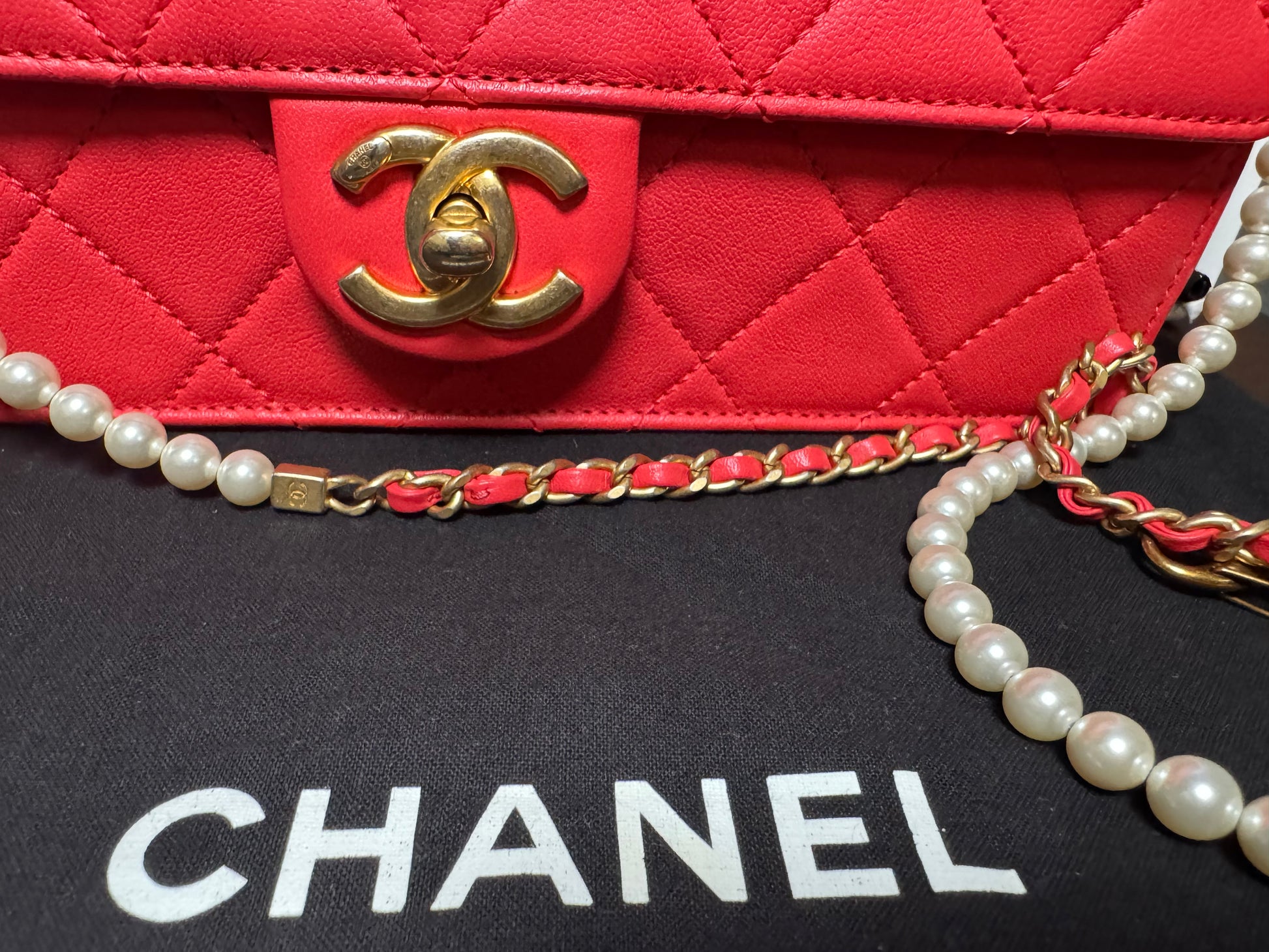 Chanel - red Pearl Lock and Strap